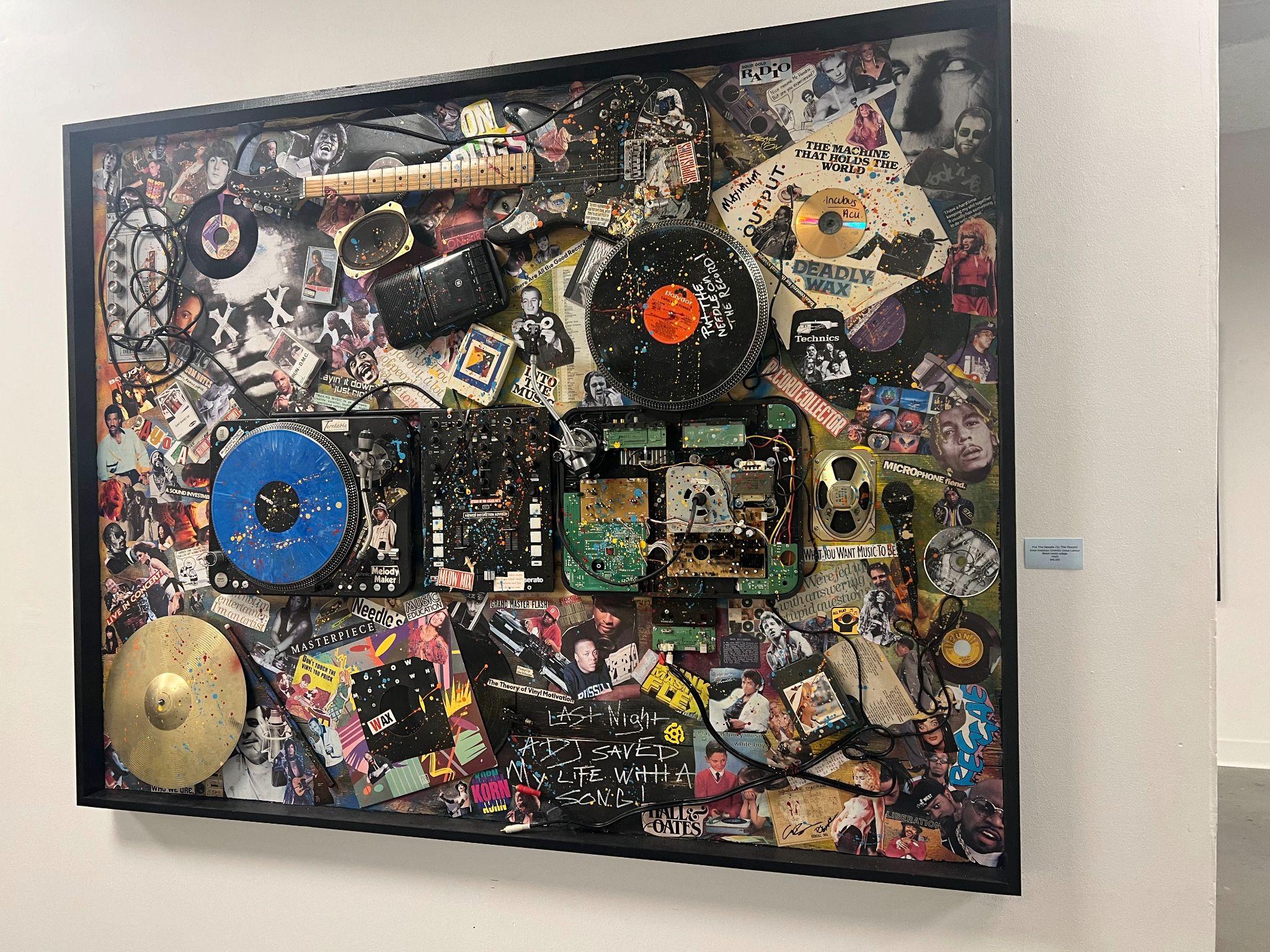 Large-scale mixed-media music collage on view during Atlanta Art Week